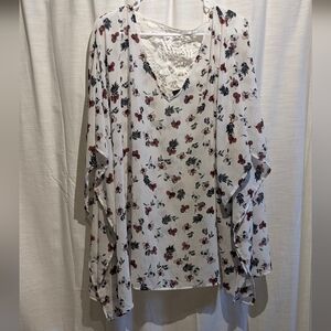 O Lane Bryant size 24. Sheer top crochet back web & split arm.